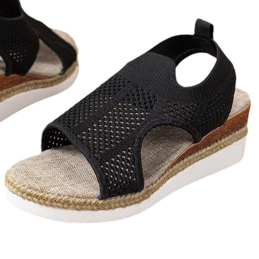 Chic Woven Wedge Sandals by Greta