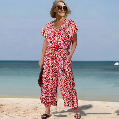 Vibrant Printed V-Neck Jumpsuit by Greta 