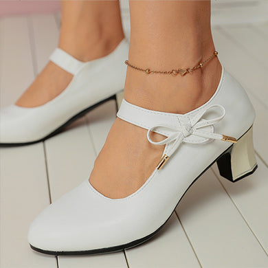 Chic Mid-Heel Buckle Pumps by Greta 