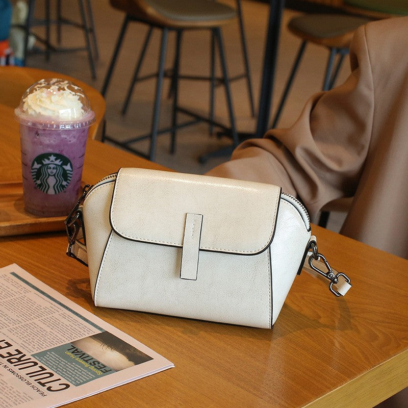 Elegante Crossbody-Tasche aus Leder mit Klappenverschluss